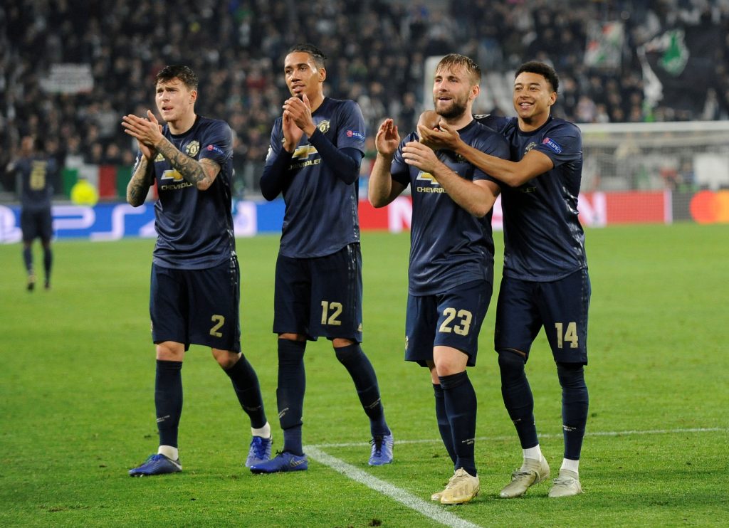Victor Lindelof, Chris Smalling, Luke Shaw and Jesse Lingard applaud the fans after the match.