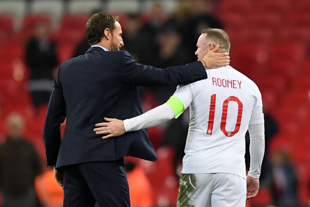 England's Wayne Rooney with manager Gareth Southgate at the end of the match.