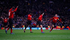 Manchester United's Marouane Fellaini celebrates scoring their first goal.