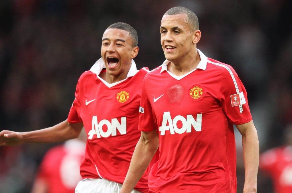 Ravel Morrison (R) celebrates with Jesse Lingard after scoring Manchester United's first goal.