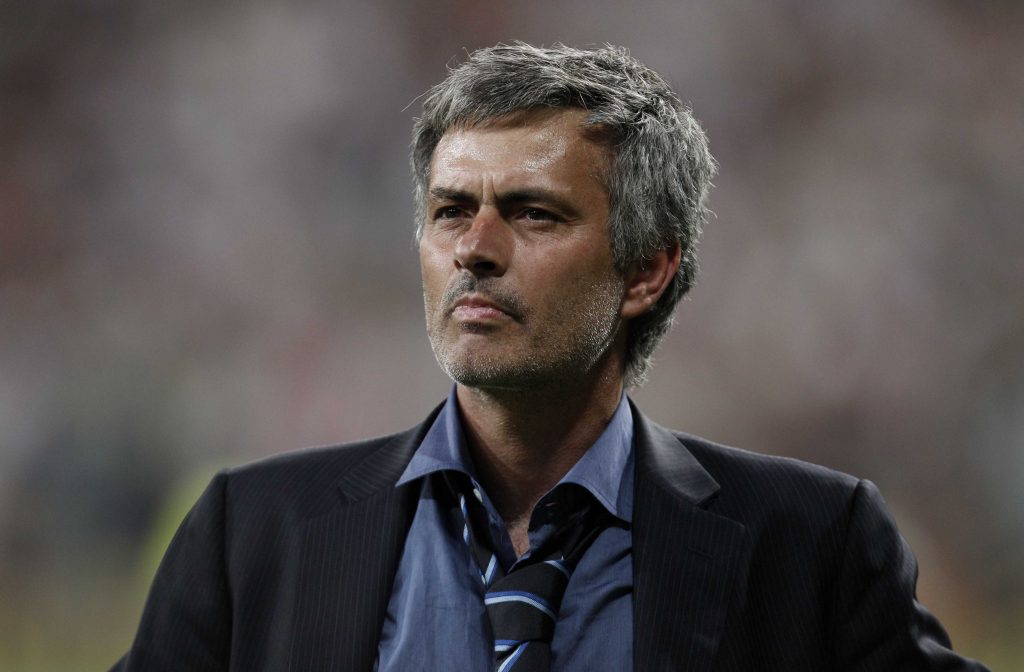 Inter Milan coach Jose Mourinho celebrates after winning the Champions League.