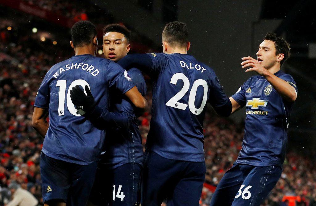 Manchester United's Jesse Lingard celebrates scoring their first goal with team mates.