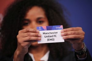 UEFA Champions League ambassador Laura Georges draws Manchester United.