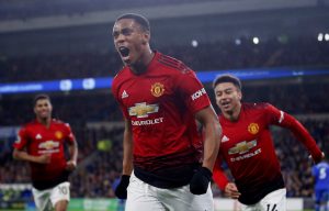 Manchester United's Anthony Martial celebrates scoring their third goal.