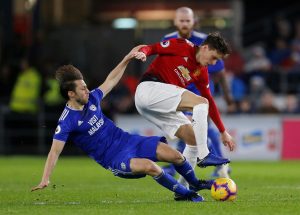 Manchester United's Victor Lindelof in action with Cardiff City's Harry Arter.