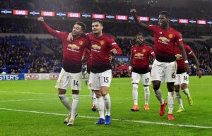 Manchester United's Jesse Lingard celebrates scoring their fifth goal with team mates.