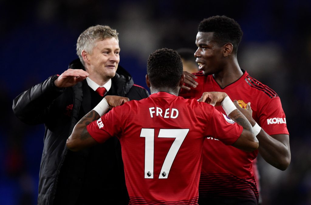 Manchester United's Paul Pogba and Fred celebrate after the match with interim manager Ole Gunnar Solskjaer.