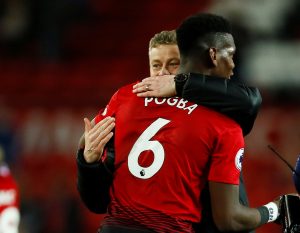 Man Utd interim manager Ole Gunnar Solskjaer celebrates with Paul Pogba after the match.