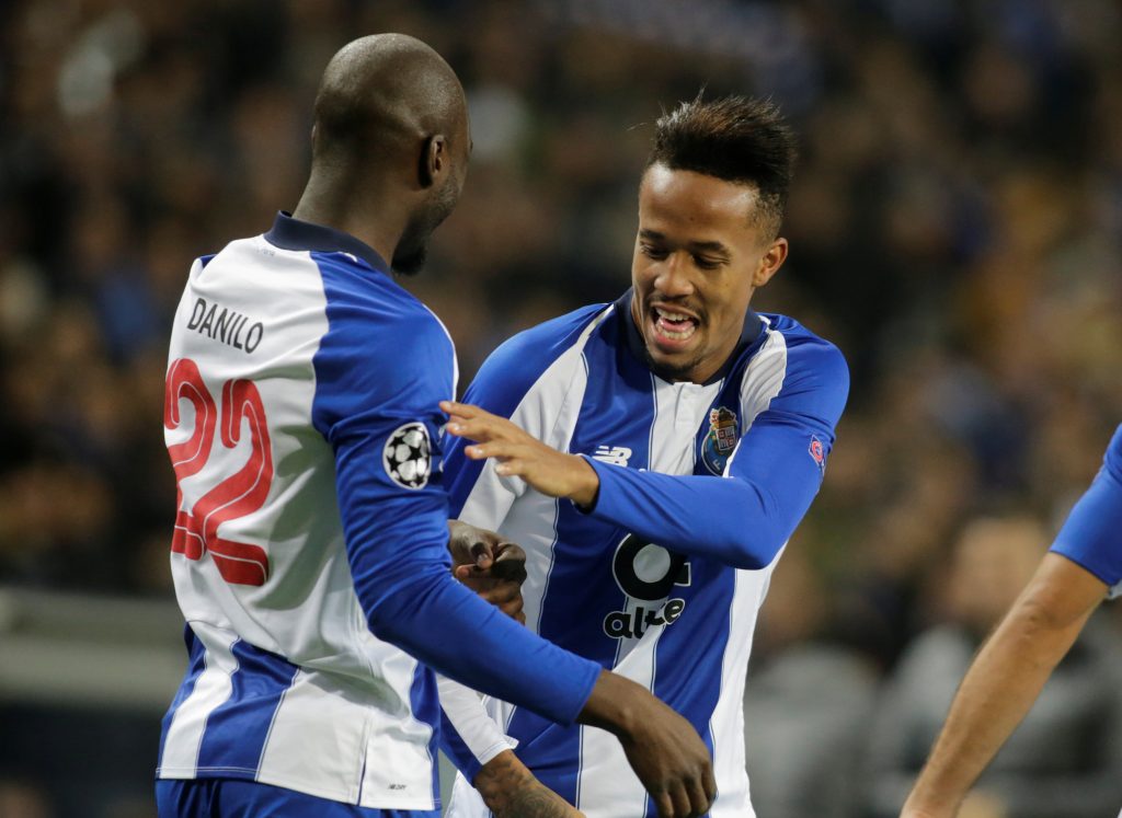 FC Porto's Eder Militao celebrates scoring their first goal with teammate Danilo Pereira.