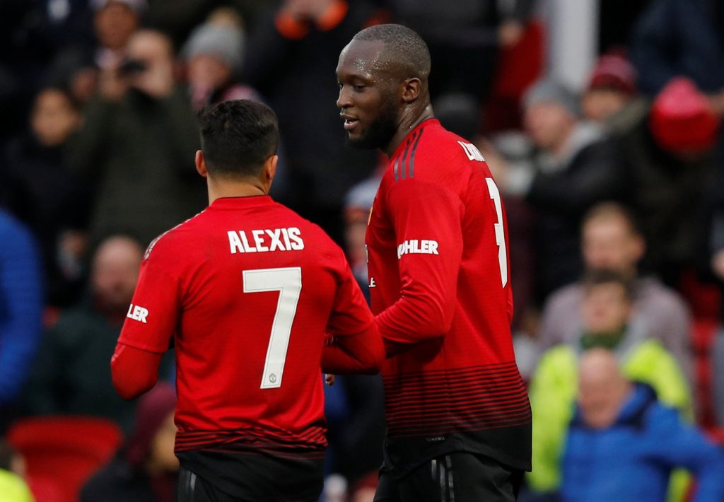 Manchester United's Romelu Lukaku celebrates with Alexis Sanchez after scoring their second goal.