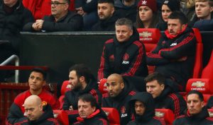 Ole Gunnar Solskjaer, assistant coach Michael Carrick, Alexis Sanchez, Juan Mata, Lee Grant and Victor Lindelof on the bench during the match.