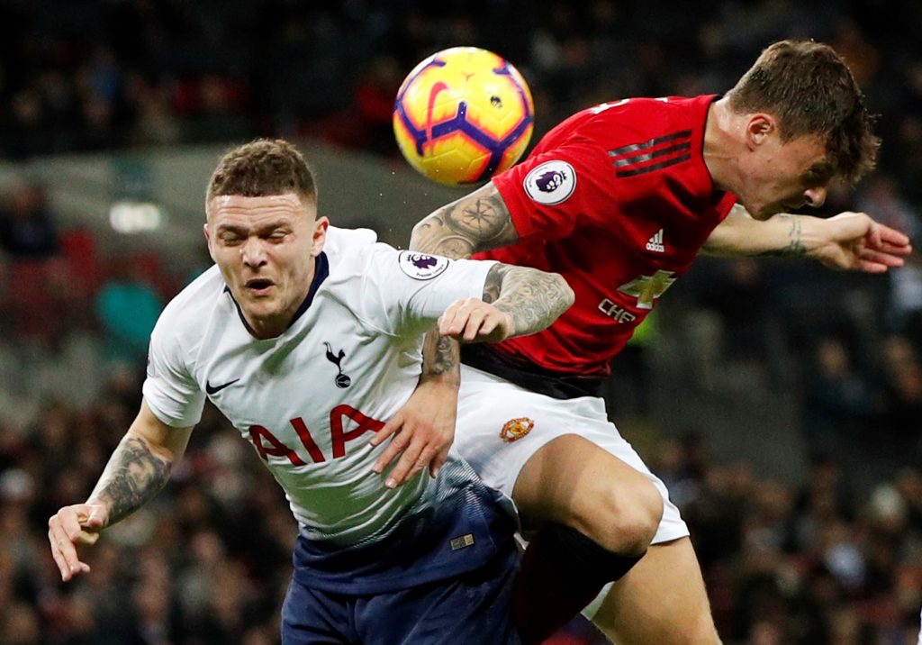 Tottenham's Kieran Trippier in action with Manchester United's Victor Lindelof.