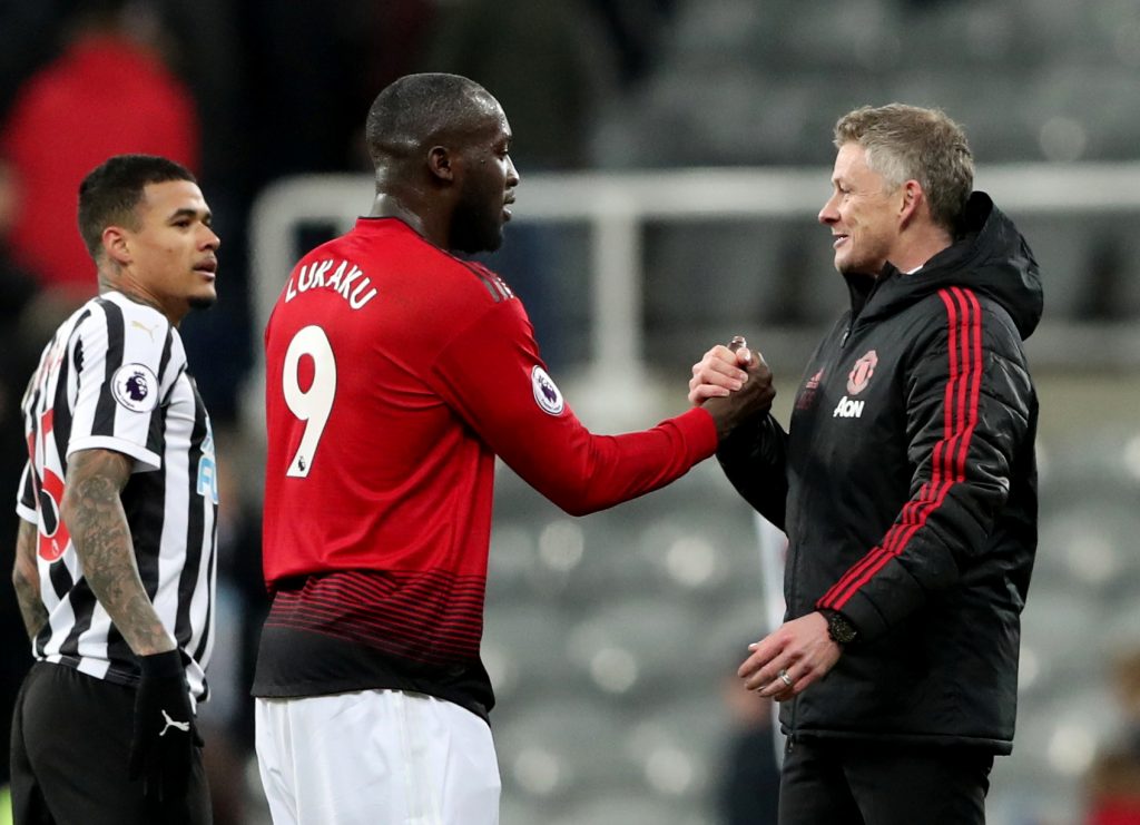 Man Utd interim manager Ole Gunnar Solskjaer shakes hands with Romelu Lukaku at the end of the match.