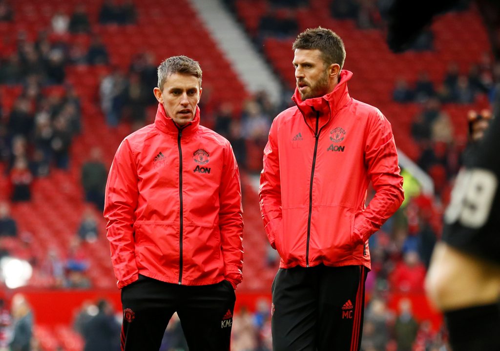 Manchester United assistant coaches Kieran McKenna and Michael Carrick during the warm up before the match.