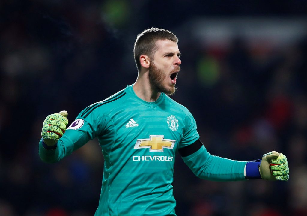 Manchester United's David de Gea celebrates after Victor Lindelof scores their second goal.