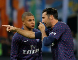 PSG's Gianluigi Buffon and Kylian Mbappe before the match.