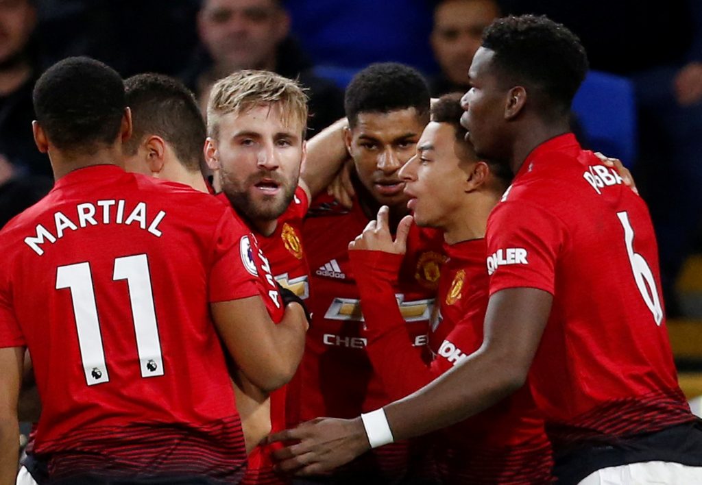 Manchester United's Marcus Rashford celebrates scoring their first goal with Paul Pogba, Anthony Martial, Jesse Lingard, Luke Shaw and team mates.