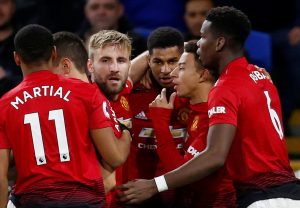 Manchester United's Marcus Rashford celebrates scoring their first goal with Paul Pogba, Anthony Martial, Jesse Lingard, Luke Shaw and team mates.