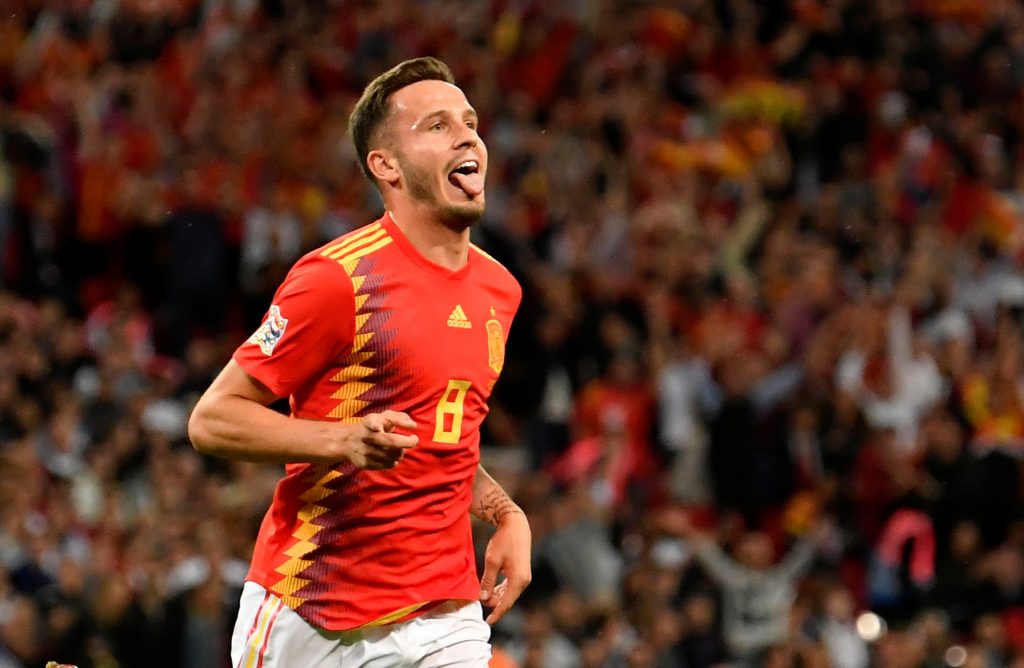 Spain's Saul Niguez celebrates scoring their first goal.