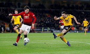 Wolves' Diogo Jota scores their second goal.