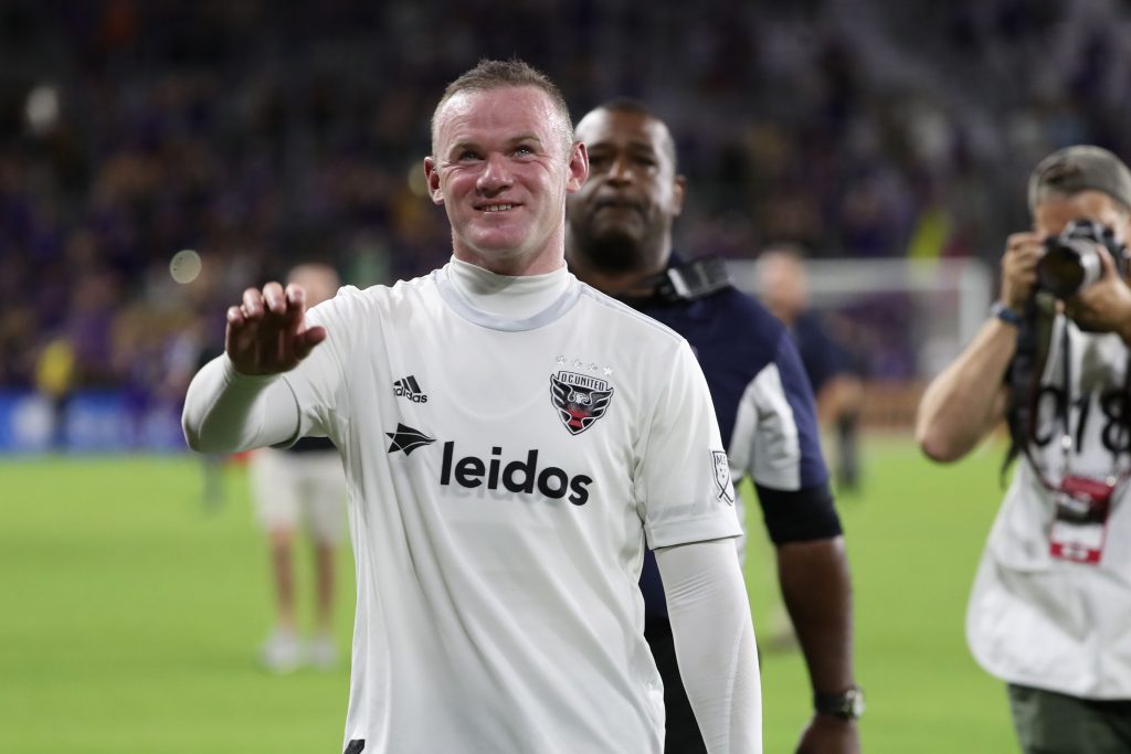 D.C. United forward Wayne Rooney (9) celebrates and smiles as they beat the Orlando City SC.