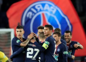 PSG's Thiago Silva and team mates celebrate after the match.