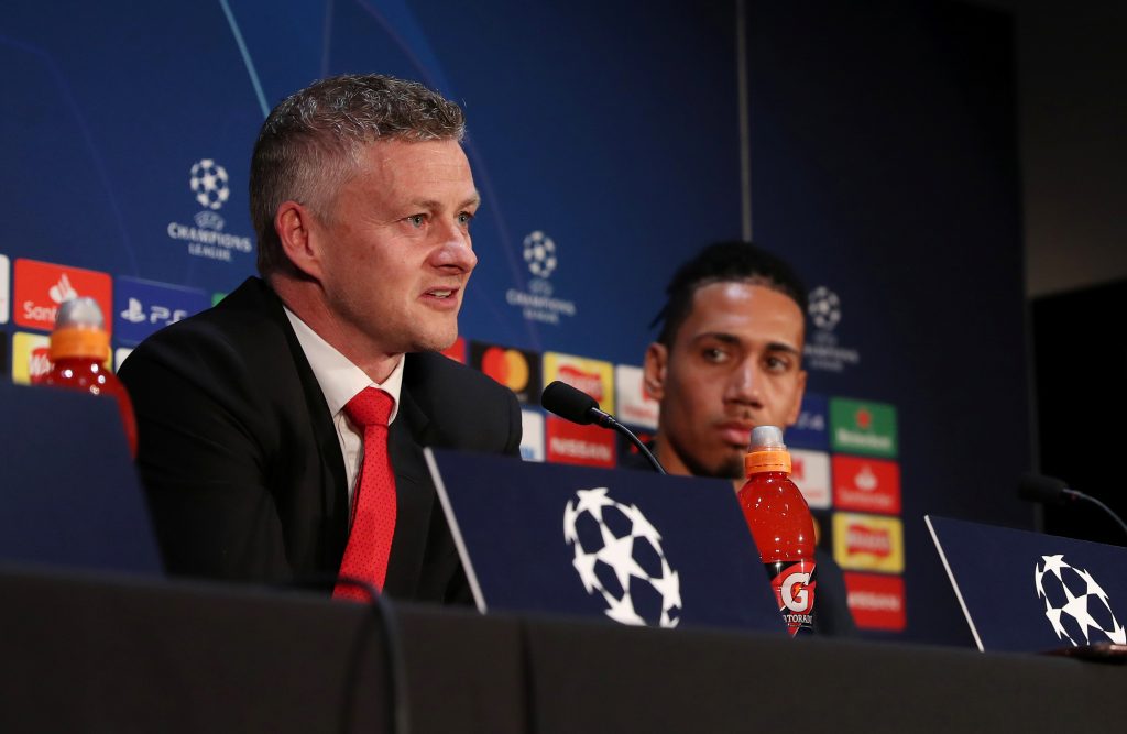 Man Utd manager Ole Gunnar Solskjaer with Chris Smalling during the press conference.