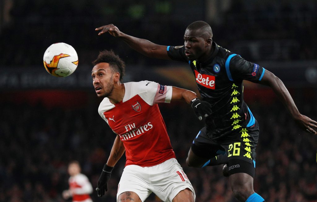 Arsenal's Pierre-Emerick Aubameyang in action with Napoli's Kalidou Koulibaly.