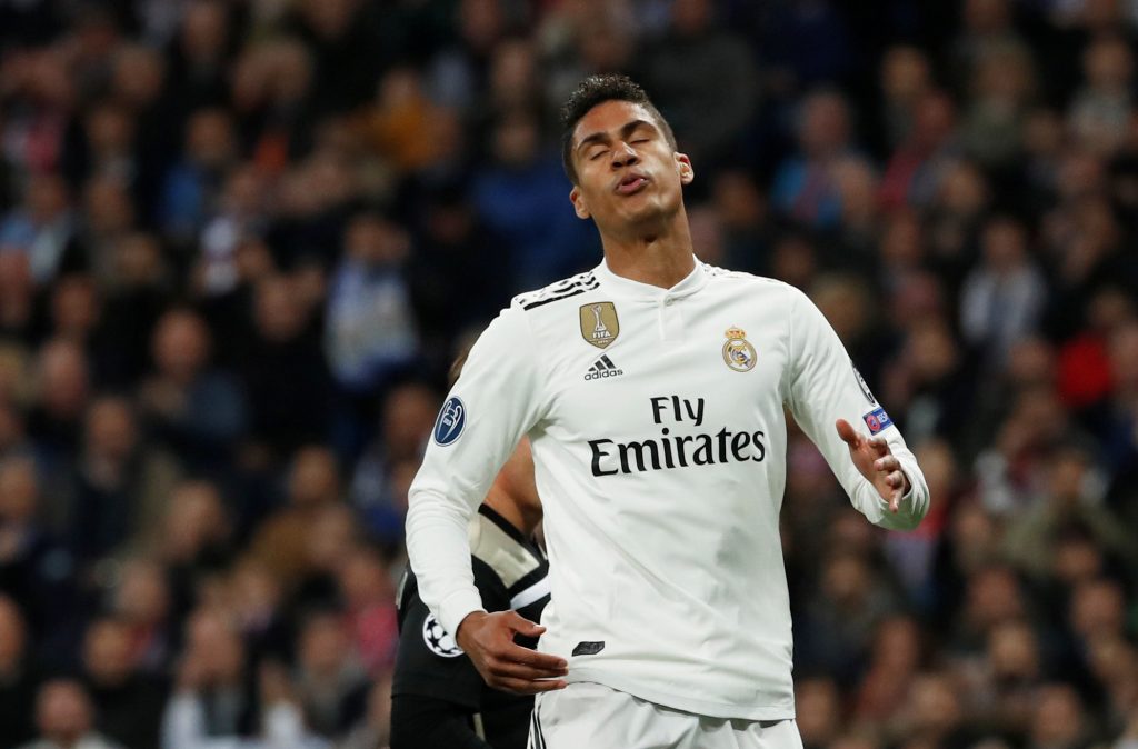 Real Madrid's Raphael Varane reacts.