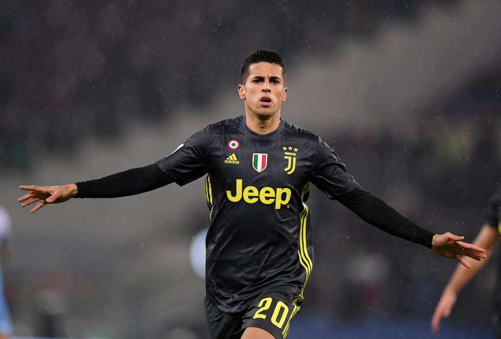 Juventus' Joao Cancelo celebrates scoring their first goal.