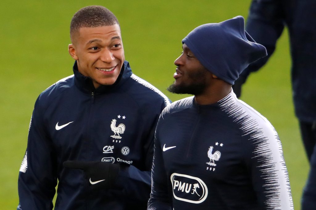 France's Tanguy Ndombele and Kylian Mbappe during training.