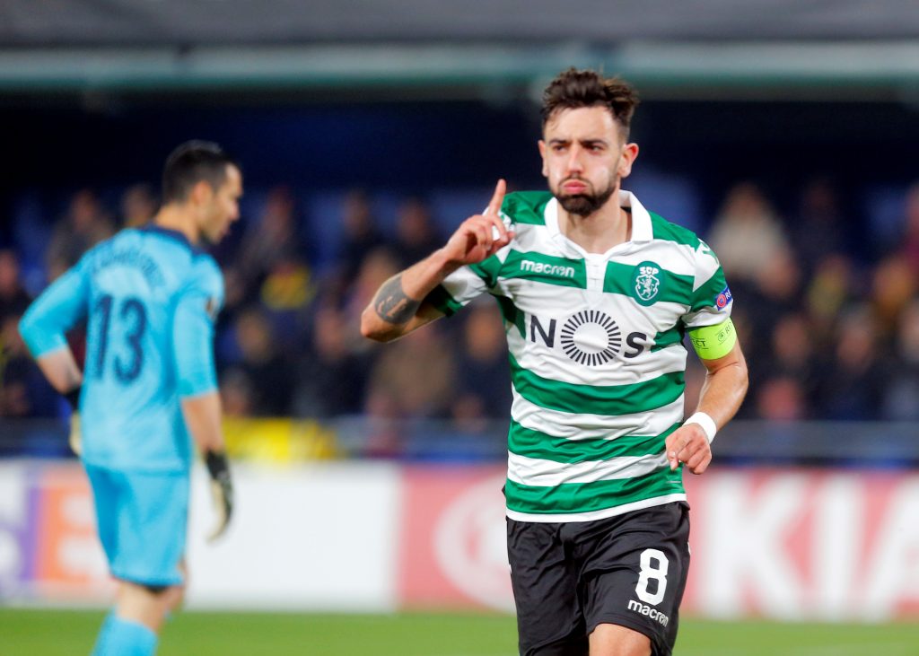 Sporting's Bruno Fernandes celebrates scoring their first goal.