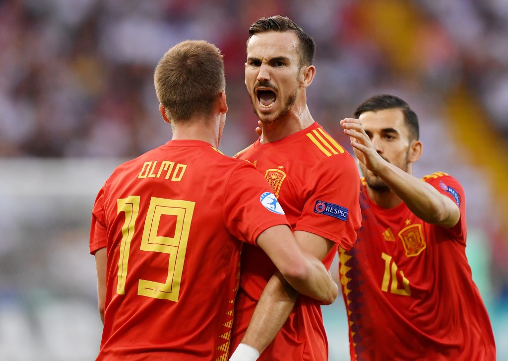 Spain's Fabian Ruiz celebrates scoring their first goal with Dani Ceballos and Dani Olmo.