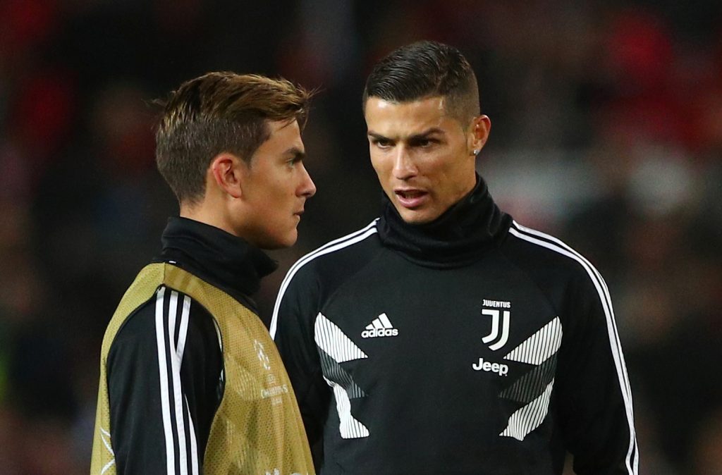 Cristiano Ronaldo and Paulo Dybala during the warm up before the match.