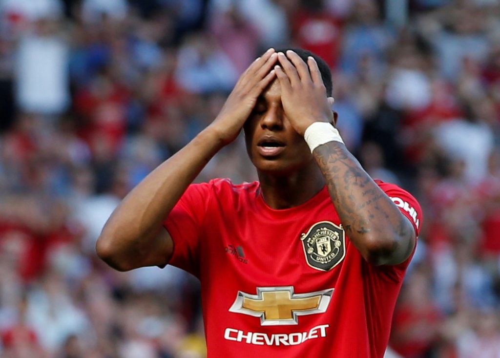 Manchester United's Marcus Rashford reacts after missing a penalty.