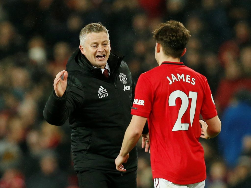 Manchester United manager Ole Gunnar Solskjaer celebrates with Daniel James.