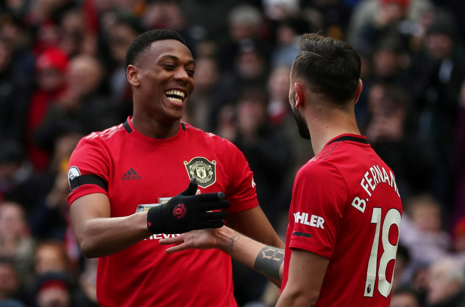 Man Utd's Anthony Martial celebrates scoring their second goal with Bruno Fernandes.