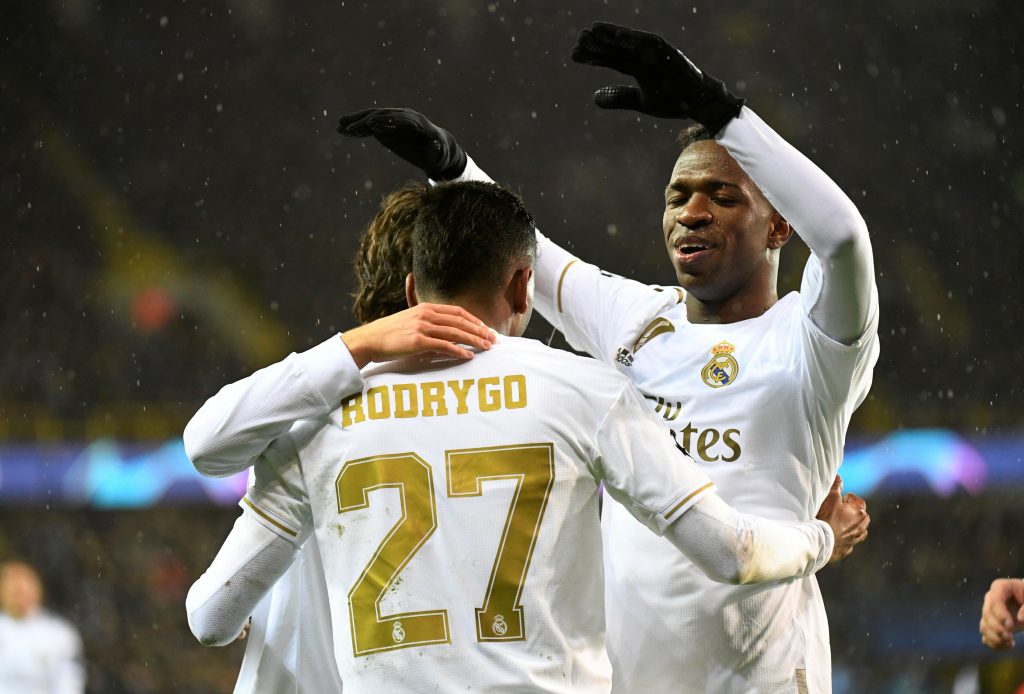 Real Madrid's Rodrygo celebrates scoring their first goal with Vinicius Junior.
