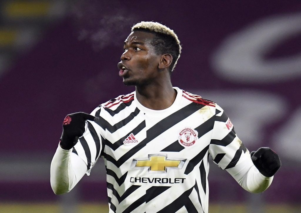 Manchester United's Paul Pogba celebrates scoring their first goal.