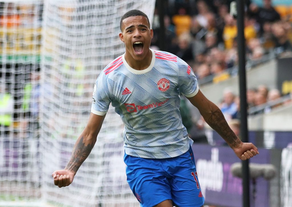 Manchester United's Mason Greenwood celebrates scoring their first goal.