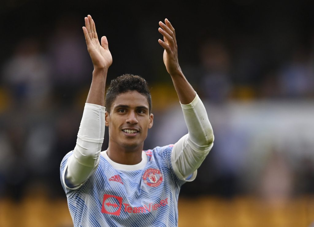 Manchester United's Raphael Varane applauds fans after the match.