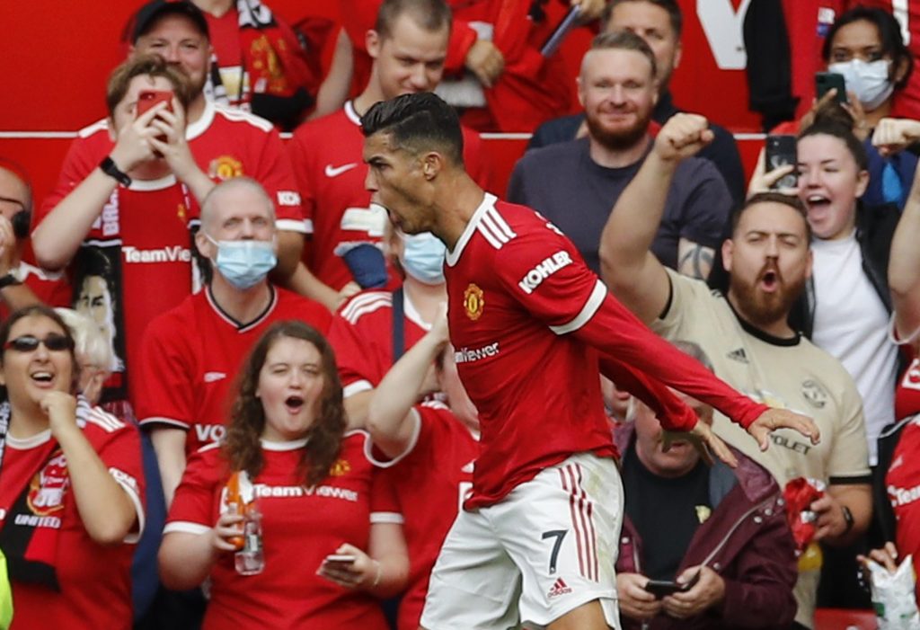 Manchester United's Cristiano Ronaldo celebrates scoring their first goal.