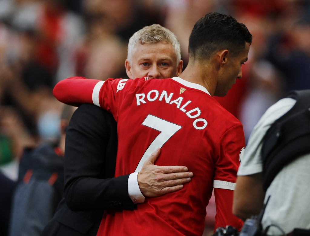 Manchester United's Cristiano Ronaldo and manager Ole Gunnar Solskjaer celebrate after the match.