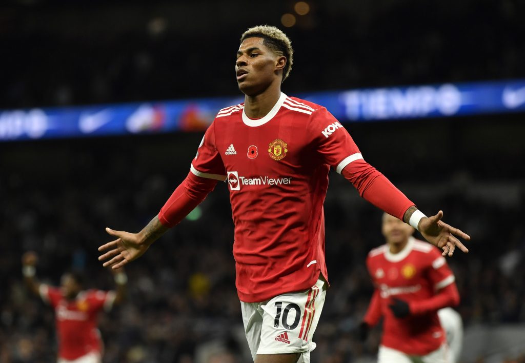 Manchester United's Marcus Rashford celebrates scoring their third goal.