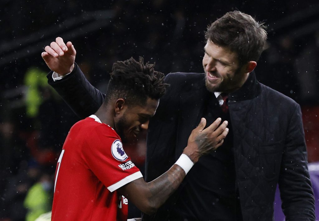 Manchester United interim manager Michael Carrick celebrates with Fred after the match.