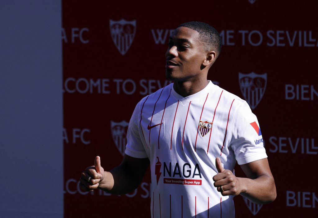 Anthony Martial poses during his presentation after signing for Sevilla on loan.