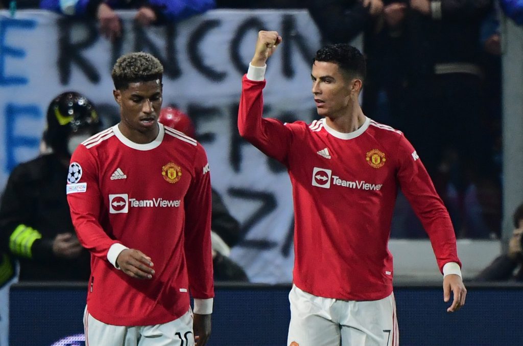 Manchester United's Cristiano Ronaldo celebrates scoring their first goal with Marcus Rashford.