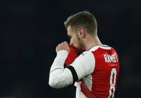 Aaron Ramsey looks dejected after the game.